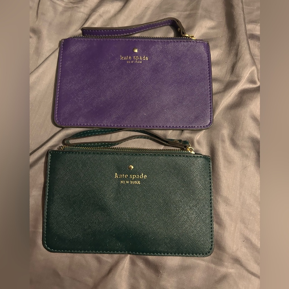 New Kate Spade wristlets. Purple and one green
Never used